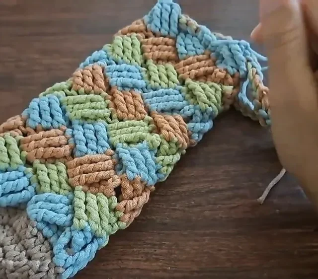 Basket weave water bottle bag with an i-cord strap