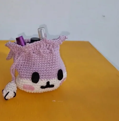 Crochet bunny bag with amigurumi legs and ears