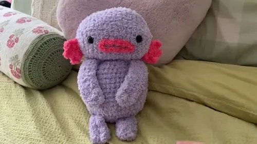 Crochet swamp monster plush with folded flat-panel limbs