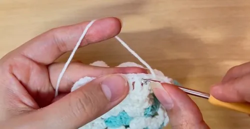 Fan stitch crochet towel holder with a wrapped ring — photo 5
