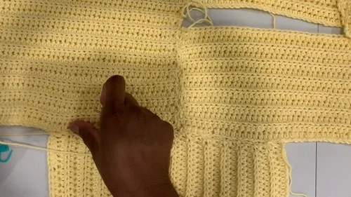 Lengthwise half double crochet baby cardigan with slip-stitch cuffs — photo 4