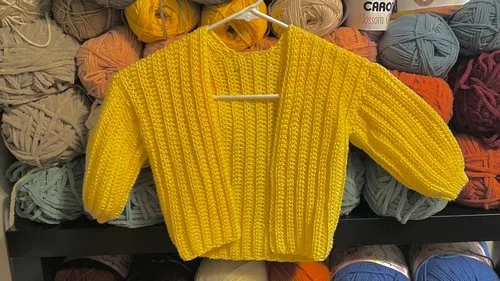Lengthwise half double crochet baby cardigan with slip-stitch cuffs