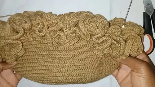 Ruffle-brim crochet hat with a flirty finish