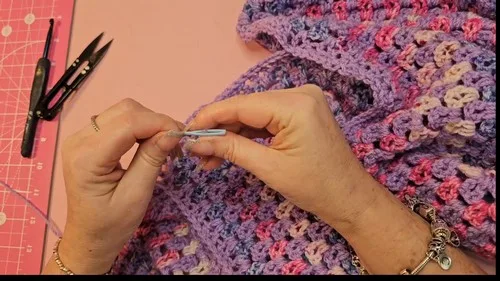 V-stitch hexagon cardigan with open lattice texture