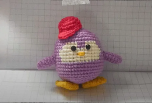 Single crochet penguin amigurumi with a rounded, stuffable body