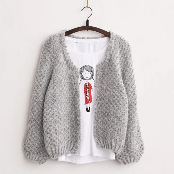 Toddler cardigan with ribbed cuffs worked in double crochet